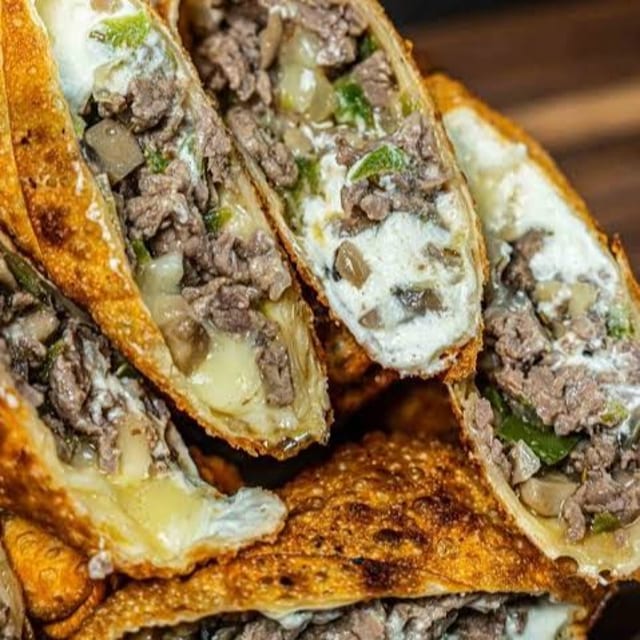 Cheese Steak Egg Rolls.